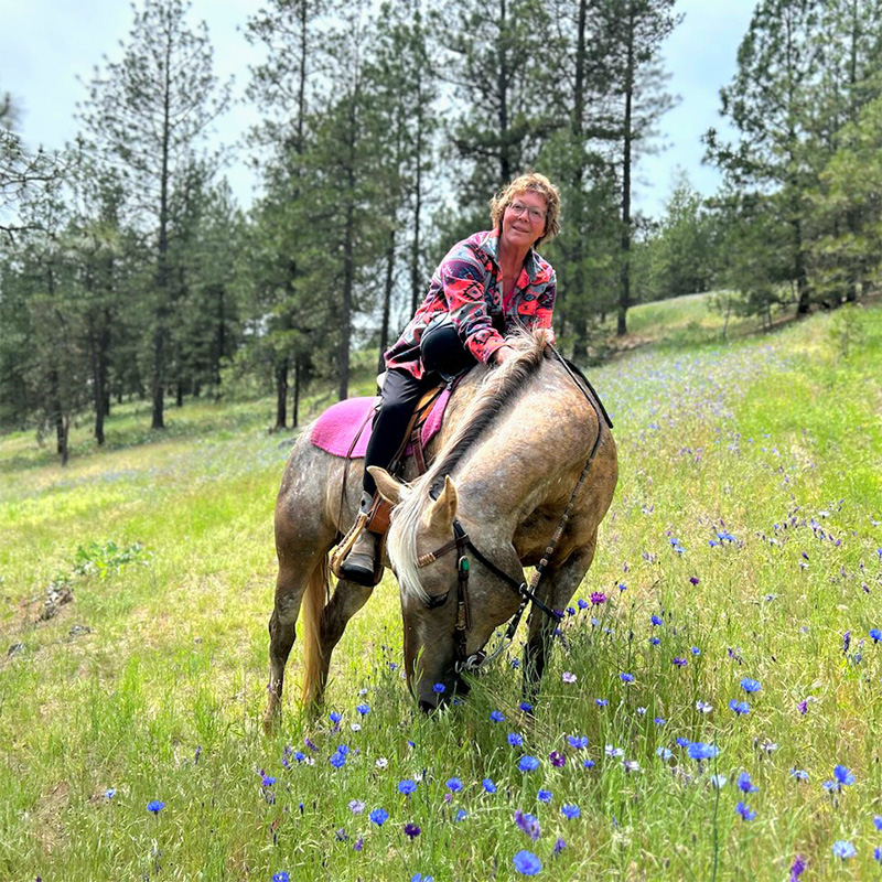 Dr. Joanna Ellington on horseback